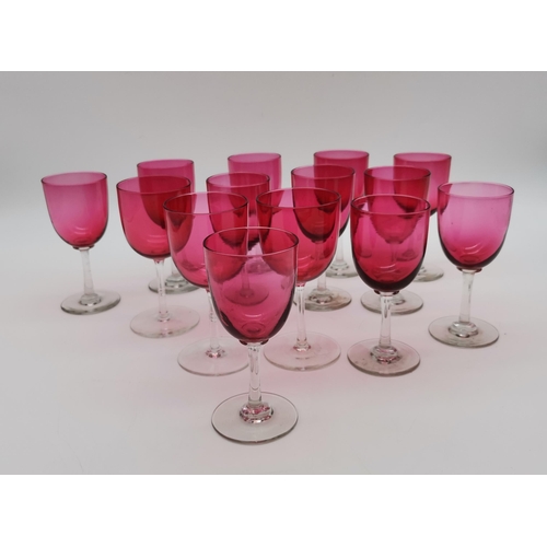 144 - A collection of Antique Red wine glasses including a water jug (a/f)