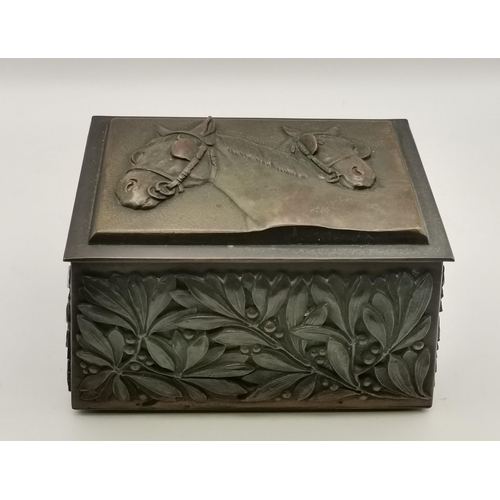 154 - Heavily carved Bronze trinket box. Top decorated with work Horses and side 13cmx 11cm x H8cm