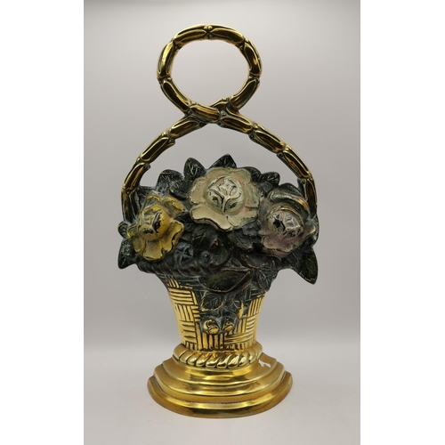 158 - Victorian cast iron and brass door stop of floral basket 33cm height