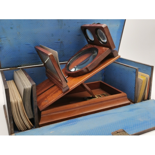 16 - A mahogany tabletop stereoscope with interchangeable detachable viewer and fold-down magnifier, late... 