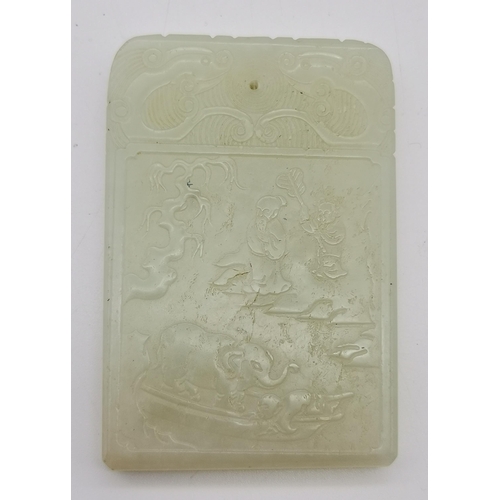 180 - A Chinese celadon jade pendant plaque, rectangular with rounded top corners, carved to the front wit... 