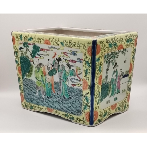 188 - A Chinese famille jaune jardinière, the rectangular planter with figural scenes to each side, the ye... 