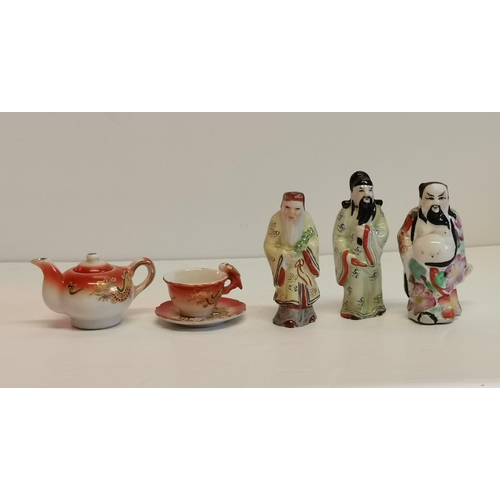 195 - Miniature Teapot with cup and saucer - dragon decor in orange and golds plus three Sanxing Fu Lu Sho... 