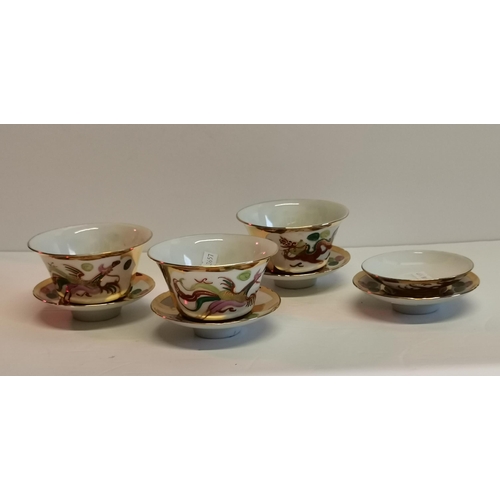 199 - Three Chinese dragon Ceramic teacups with four saucers (1 with Chip) finished with gilt gold, plus s... 