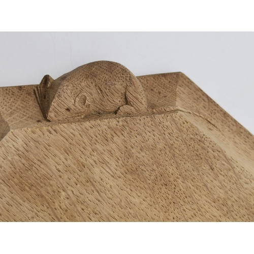 201 - Robert Thompson, a Mouseman oak bread board, elongated octagonal, lightly adzed surface and edge, wi... 