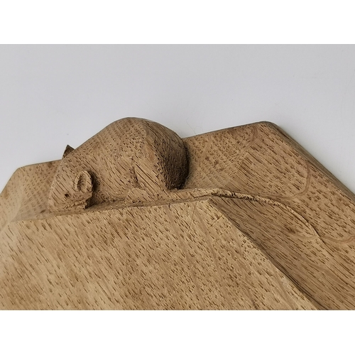 201 - Robert Thompson, a Mouseman oak bread board, elongated octagonal, lightly adzed surface and edge, wi... 