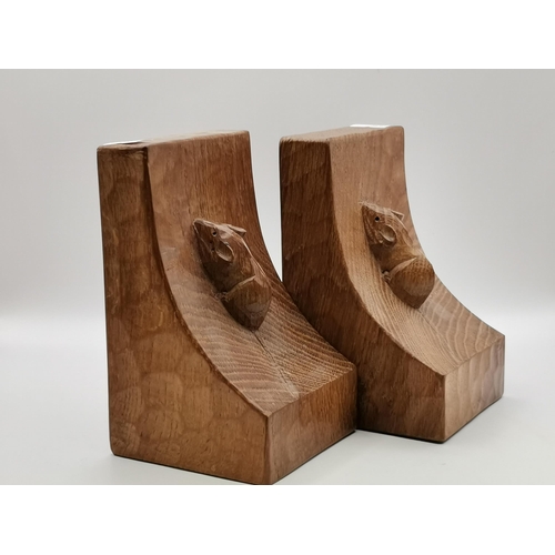 207 - Robert Thompson, a pair of Mouseman bookends, of typical form, lightly adzed all over, each with car... 