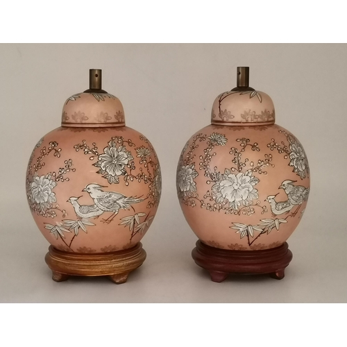 247 - Pair of Vintage Oriental vases/ urns with floral and bird motif on wooden stands 28cm height