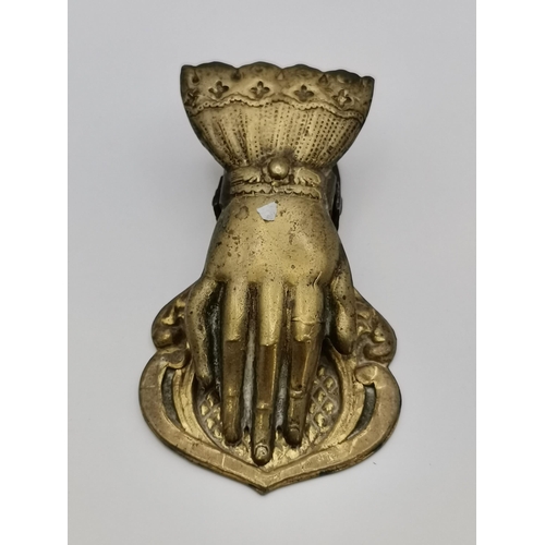 249 - A small group of metalware comprising a bronze and brass mortar; a Touareg telek dagger with sheath;... 