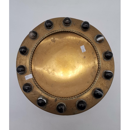 27 - A 19th Century brass and banded agate mounted tazza, the dished centre with a rope-twist border, the... 