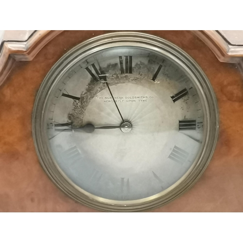 48 - A small walnut mantel clock, late 19th/early 20th Century, the circular engine-turned dial signed 'T... 