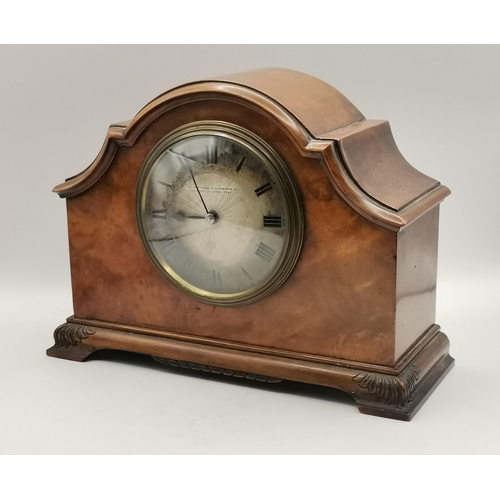 48 - A small walnut mantel clock, late 19th/early 20th Century, the circular engine-turned dial signed 'T... 