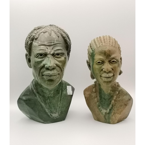 66 - Robert J Dodzo (Zimbabwe), Two Shona African carved stone busts, a male and a female, each signed to... 