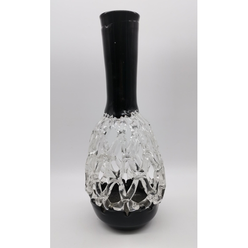 74 - A large contemporary black and clear glass pedestal centrepiece and vase, each with modernist openwo... 