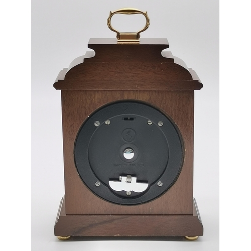 80 - An Elliott mantel clock, late 20th Century, retailed by Ainsworth Blackburn, the dial signed and wit... 