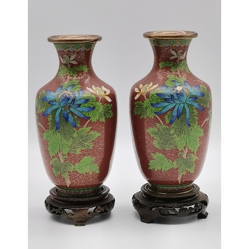 84 - A pair of cloisonné vases with stands H20cm