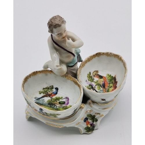 87 - A group of assorted floral porcelain, including a late 19th Century figural cruet by Helena Wolfsohn... 