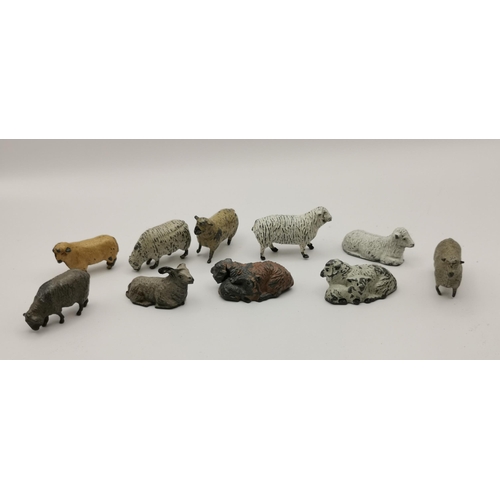 251 - A collection of Antique Lead Animals and farming/country lead figures