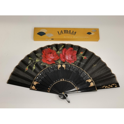 254 - A collection of Oriental items, 20th Century, comprising two fans, a reproduction scroll painting of... 