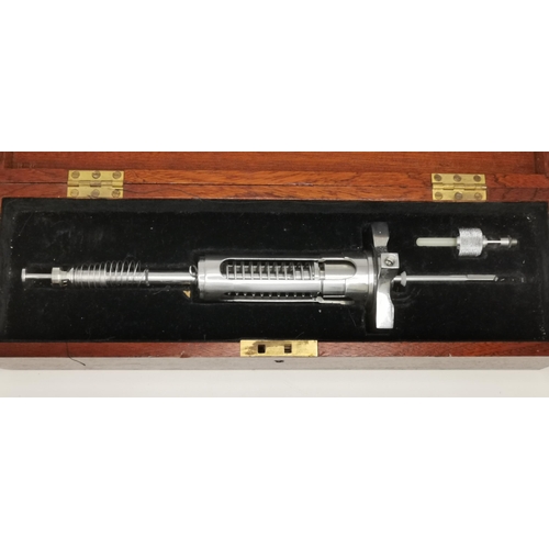 256 - A vintage Vickers-Dawson Silverstream Filling Valve in fitted wooden case, with brass name plaque to... 