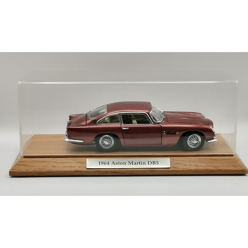 273 - A collection of model cars and car parts including 1964 Aston Martin DB5, Aston Martin V12 Vanquish ... 