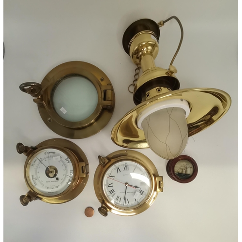 283 - Various brass ship's instruments and fittings, including a clock, barometer, small port hole window,... 