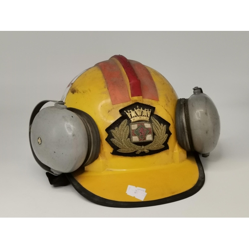 286 - A vintage yellow Protector Tuff Master hard hat with ear protection, with British Petroleum Tanker o... 