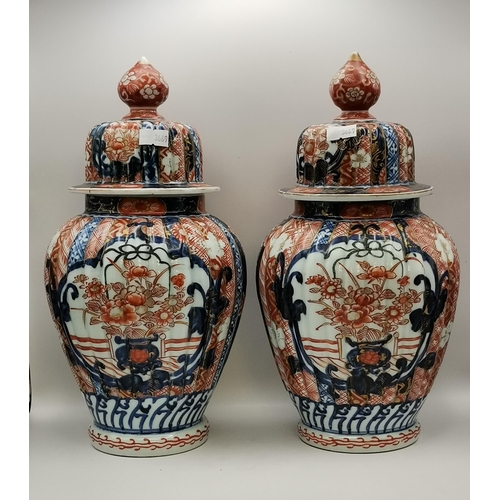 304 - A collection of assorted Imari decorated porcelain wares, including a pair of lobed baluster vases a... 