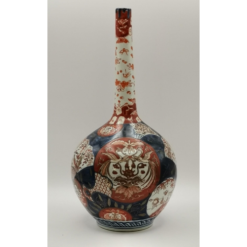 304 - A collection of assorted Imari decorated porcelain wares, including a pair of lobed baluster vases a... 