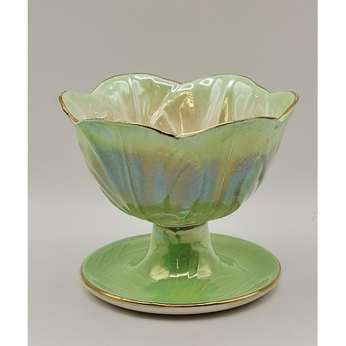 306 - A set of eleven Maling lustre green sundae bowls with gilt rims, black printed factory mark to bases... 