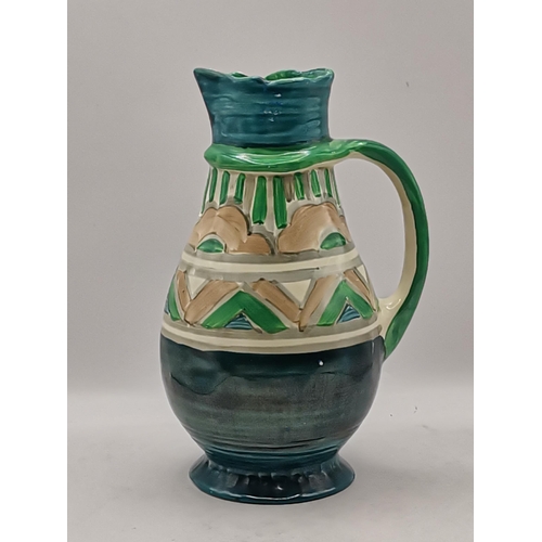 310 - Myott, Son & Co., a collection of assorted Art Deco pottery comprising a set of four sack jugs, hand... 