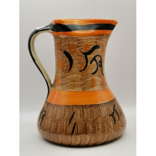 310 - Myott, Son & Co., a collection of assorted Art Deco pottery comprising a set of four sack jugs, hand... 