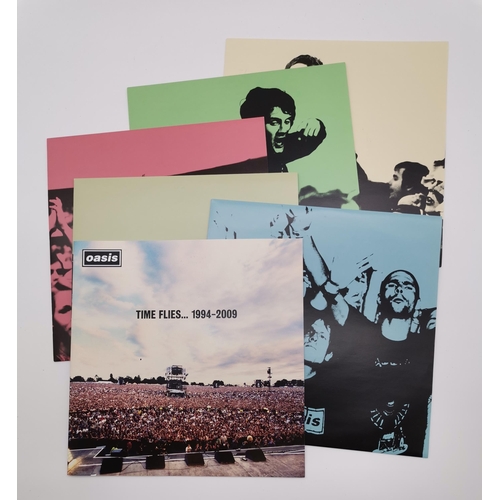 324 - Oasis 'Time Flies' 1994-2009 the complete Oasis singles collection boxset 5x12