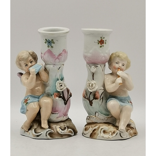 326 - A collection of German pottery including Meissen figurines and candle sticks and Half doll glazed bu... 