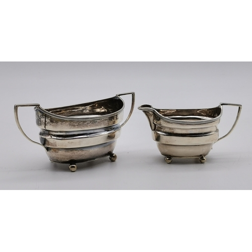 353 - A late Victorian silver three-piece bachelor's tea service by William Charles Fordham & Albert Buckl... 