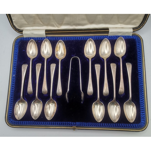 354 - A set of George V silver teaspoons and sugar nips by Cooper Brothers & Sons Ltd, Sheffield 1913, the... 