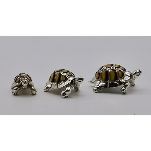 379 - Saturno: A graduated trio of silver and enamel tortoises, import marks Mark Houghton Ltd, London 199... 