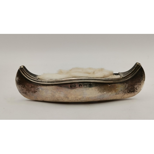 382 - An Edwardian silver novelty pin cushion by Levi & Salaman, Birmingham 1905, in the form of a canoe, ... 