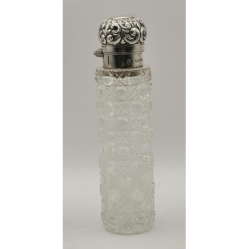 384 - A late Victorian silver-lidded cut-glass scent flask by Charles Asprey & Charles Asprey junior, Lond... 