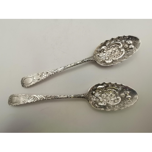 395 - A pair of George III silver table spoons by Robert Sallam, London c.1770, later pierced and chased a... 