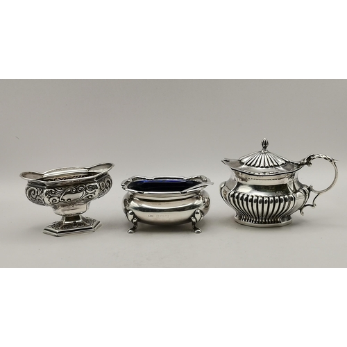 397 - A small mixed group of silver cruet tablewares comprising a late Victorian pedestal salt by Arthur F... 