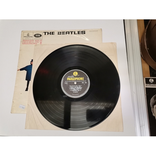 325 - The Beatles, three vinyl LP albums comprising 'HELP!' (first press), 'Please Please Me' and 'with th... 