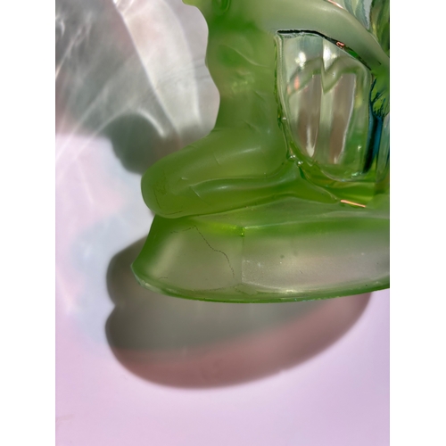 333 - An Art Deco figural uranium glass vase, with two females kneeling facing outwards, their hands joine... 