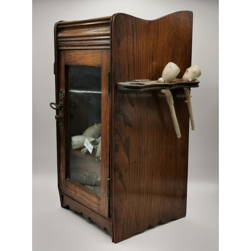 17 - Antique Victorian Smokers Cabinet with glass door and key and small drawer complete with a collectio... 