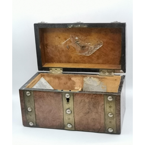 44 - A 19th Century burr walnut dome-topped tea caddy, the casket bound with engraved brass straps and st... 