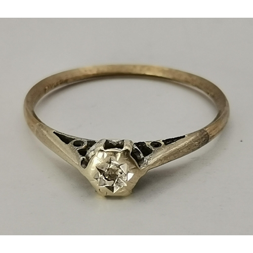 433A - An 18 carat gold and platinum white stone cluster ring, the seven round stones set as a flowerhead, ... 