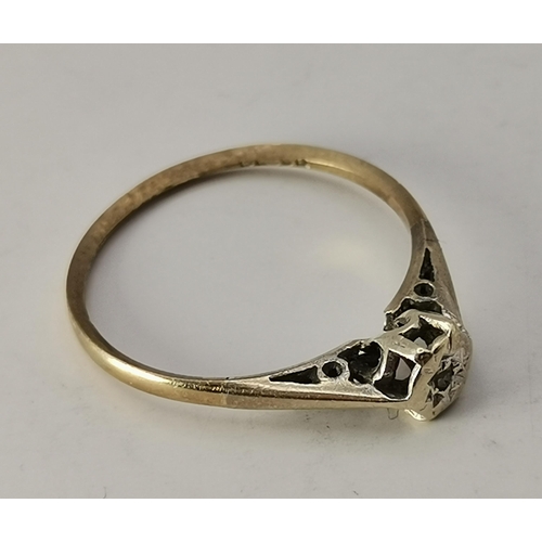 433A - An 18 carat gold and platinum white stone cluster ring, the seven round stones set as a flowerhead, ... 