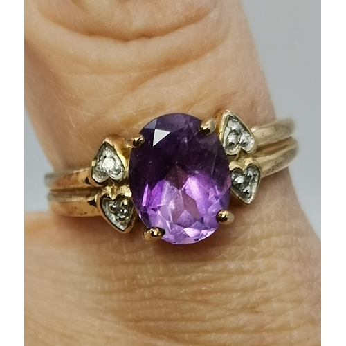 434A - Three 9 carat gold purple stone rings, the first claw-set with a cloudy oval stone to trifurcated op... 