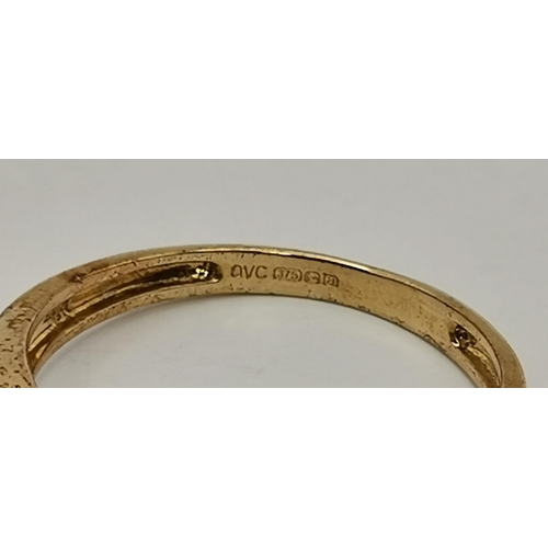 434A - Three 9 carat gold purple stone rings, the first claw-set with a cloudy oval stone to trifurcated op... 