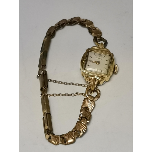 438 - A lady's 9 carat gold watch, the white circular dial signed Aoia 15 Jewels, with gilt Arabic numeral... 